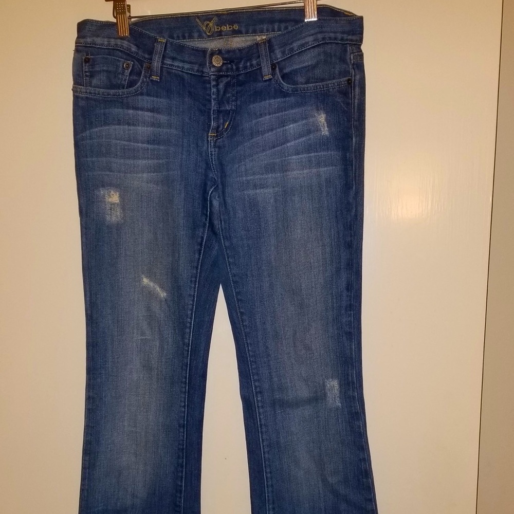 Bebe boot cut jeans. I used to work there, worn very few times.